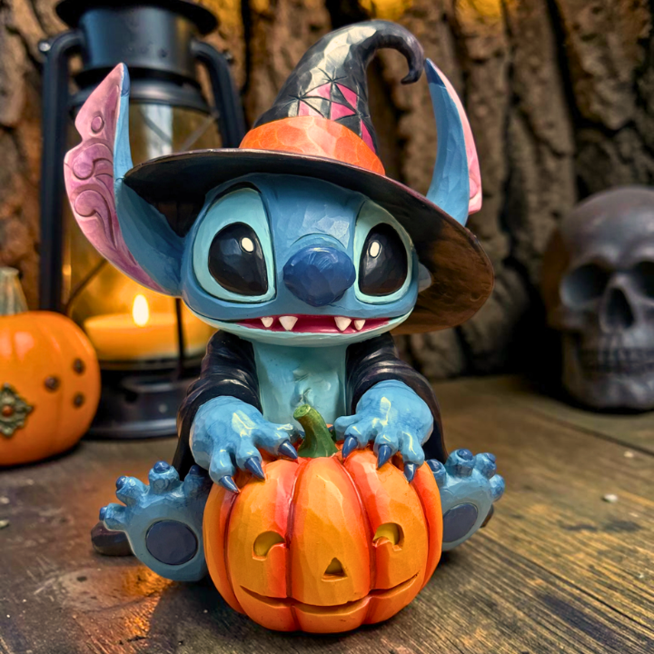 Disney Stitch als kleine Hexe mit Kürbislaterne
