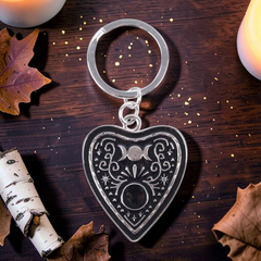 Schwarze Planchette Schlüsselanhänger mit Sternenmotiv